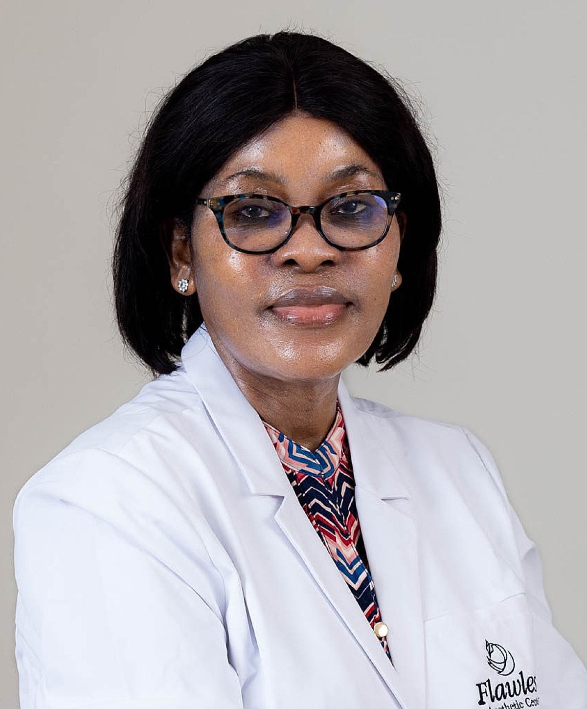 Female doctor in a white lab coat.